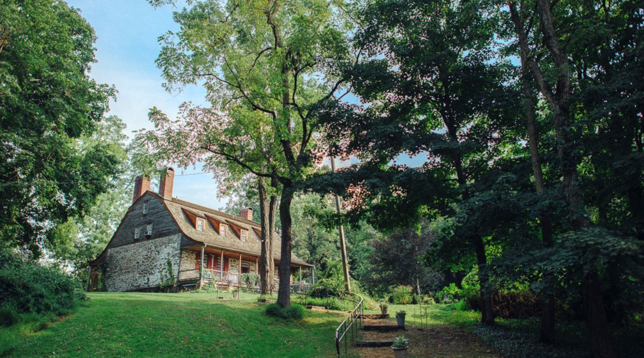 The Verplanck Family Homestead, as viewed up the hill from the historic Dutch barn, at Mount Gulian Historic Site, Beacon